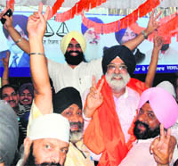 Jaspal Pardhan celebrates along with his supporters after being elected the Patiala Mayor.