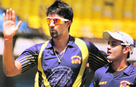 Punjab�s Rahul Sharma claimed a hat-trick against Uttar Pradesh in Indore on Saturday.