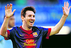 Barcelona�s Lionel Messi celebrates after scoring during the Spanish league match against Celta de Vigo in Vigo on Saturday