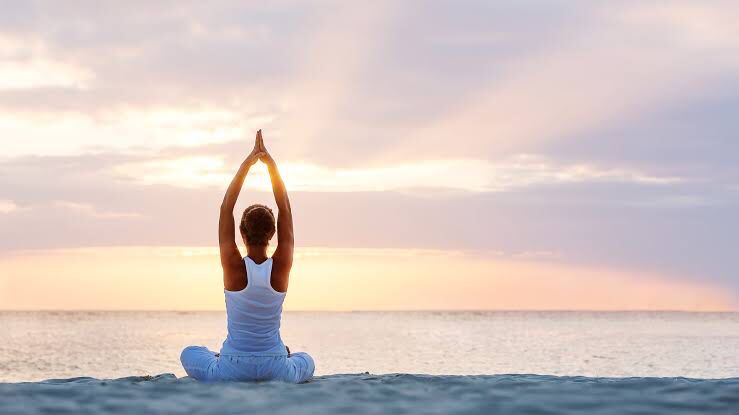 wellness-tourism-yoga-beach