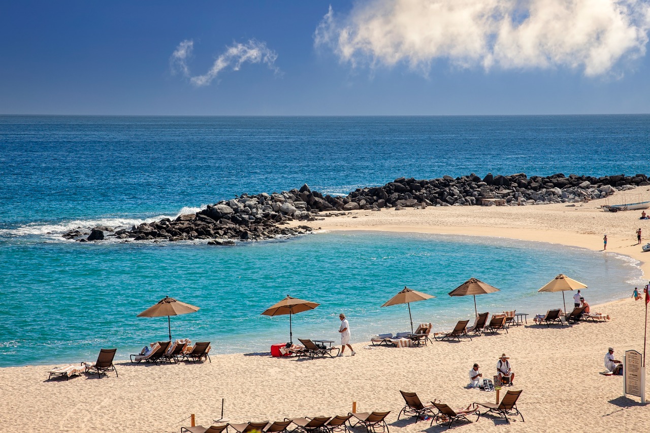 people at the beach in Los Cabos