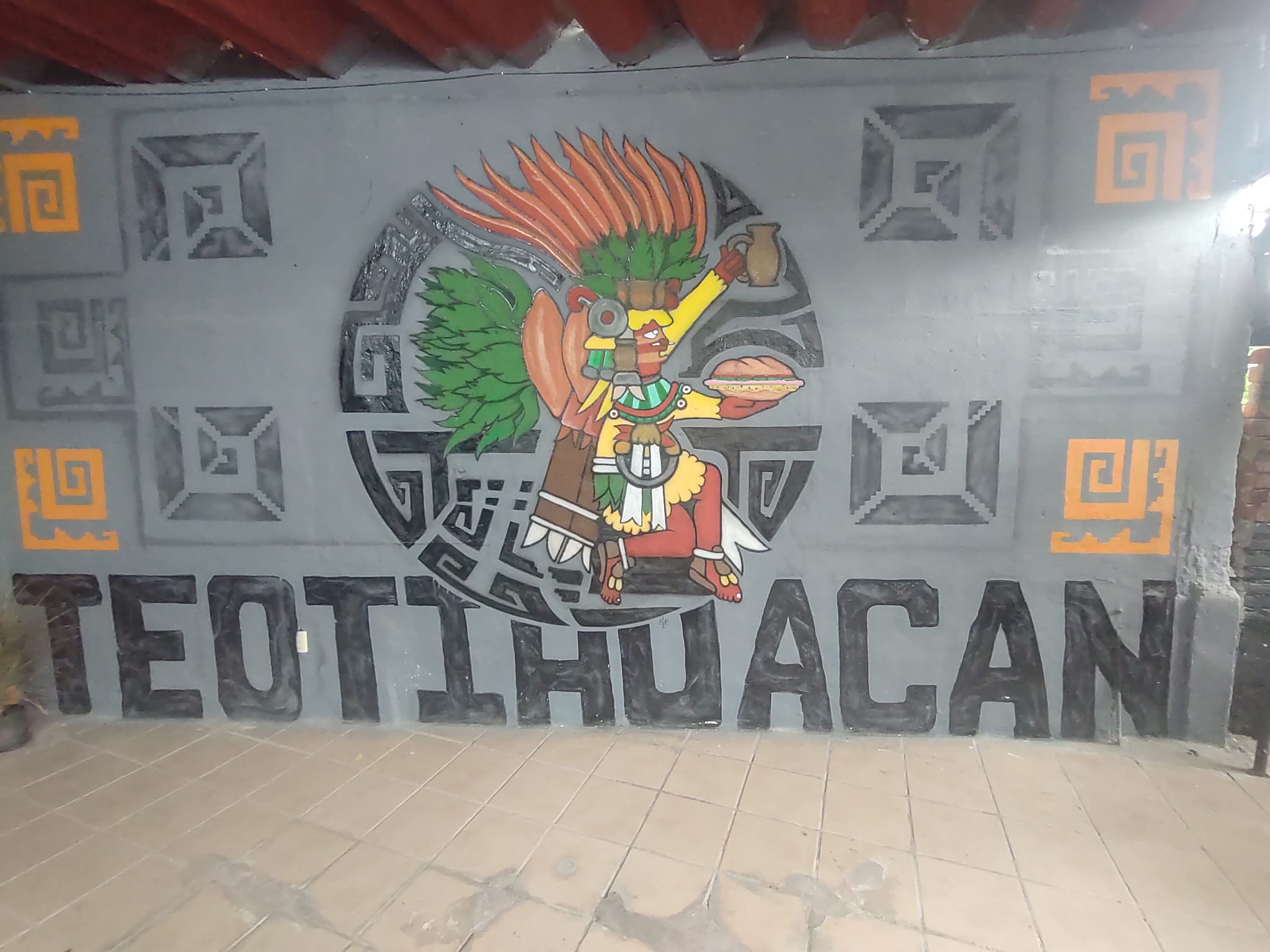 tortas y pulques teotihuacan logo and mural