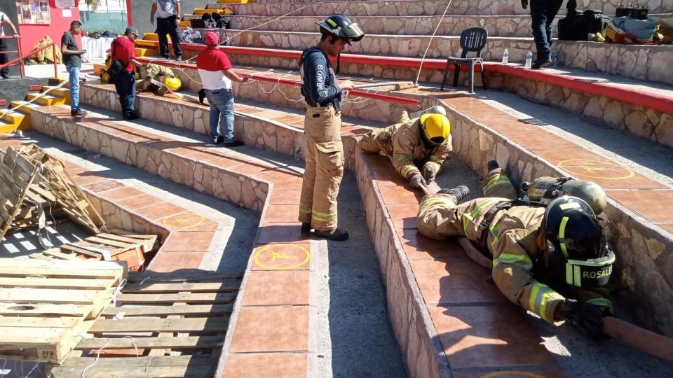 firemen in drill exercises