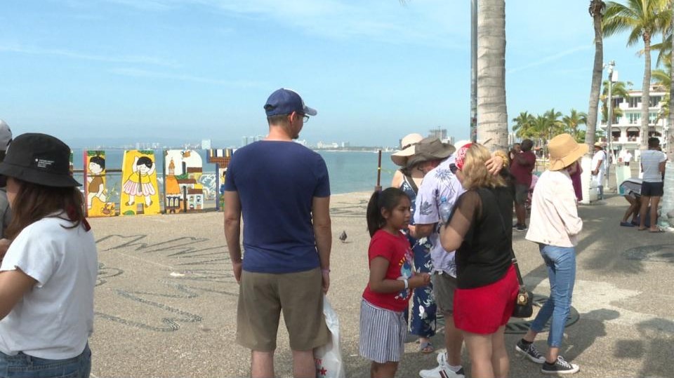 tourists on Puerto Vallarta malecon