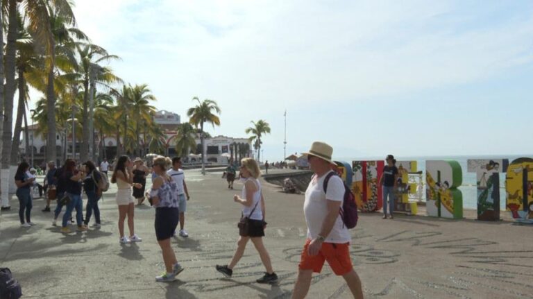 tourists walking on the Puerto Vallarta Malecon