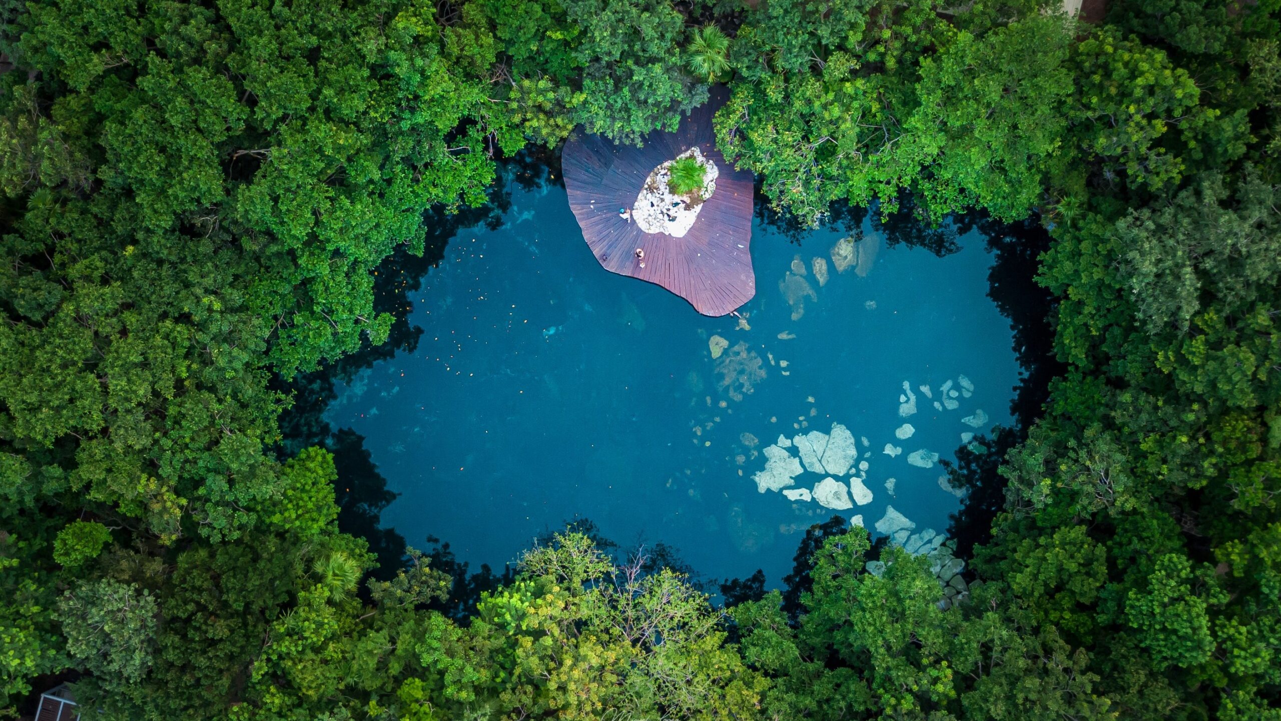 aerial view of a cenote near cancun