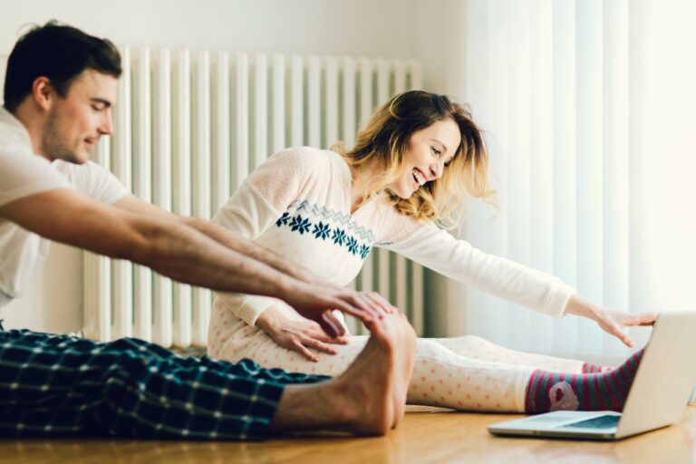 couple doing yoga poses