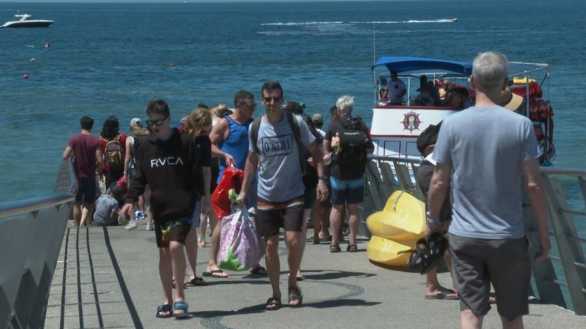 Passengers disembarking on a pier in Puerto Vallarta