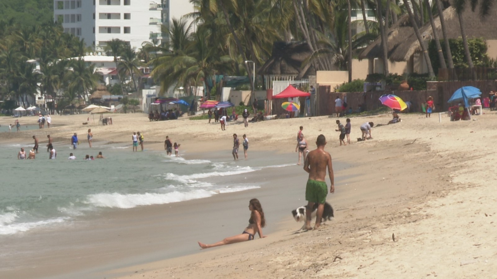 tourists on the beach at Bahia de Banderas