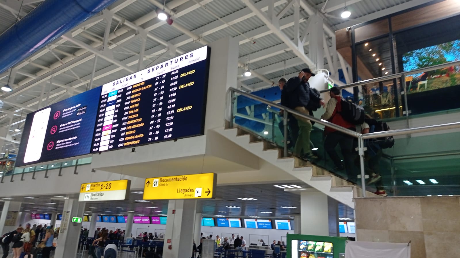 departures board in the Puerto Vallarta International Airport