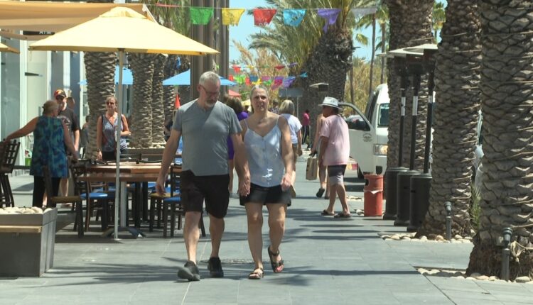 tourists walking in Los Cabos park