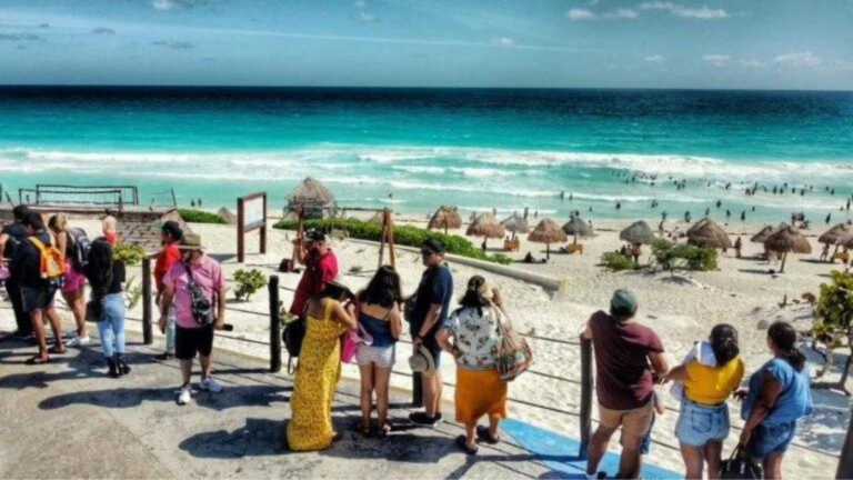 tourists on the beach in Cancun