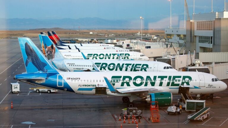 Frontier airplanes parked in Cancun airport