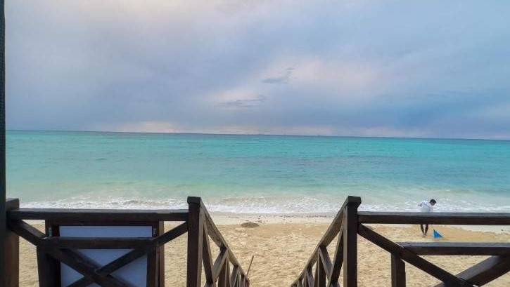 riviera maya hotel dock with sea and beach
