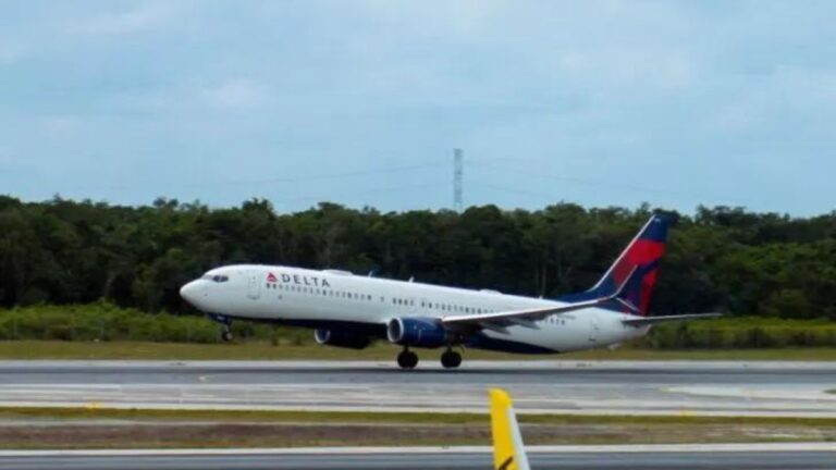 Delta airplane taking off Cancun airport