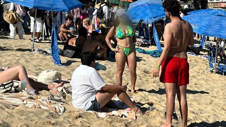 tourists on Los Cabos beach