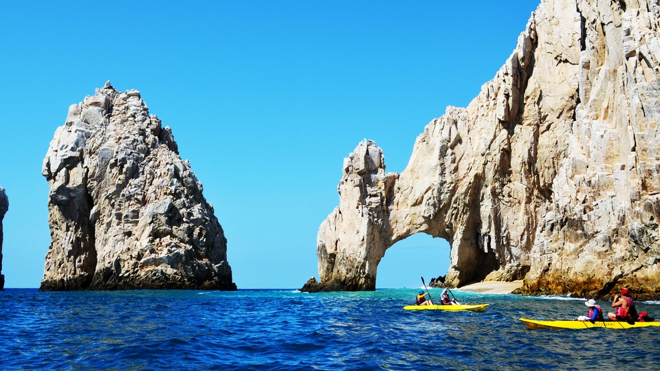 Kayakers at Land's End, El Arco