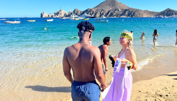 tourists on Los Cabos beach