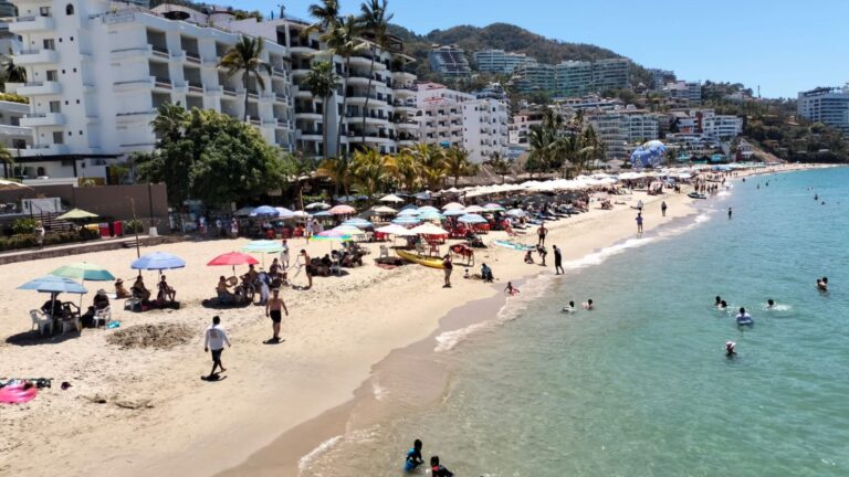 Tourists on the beach during Holy Week in Puerto Vallarta