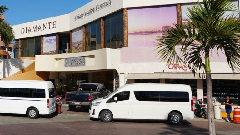 Uber vans parked on Los Cabos street