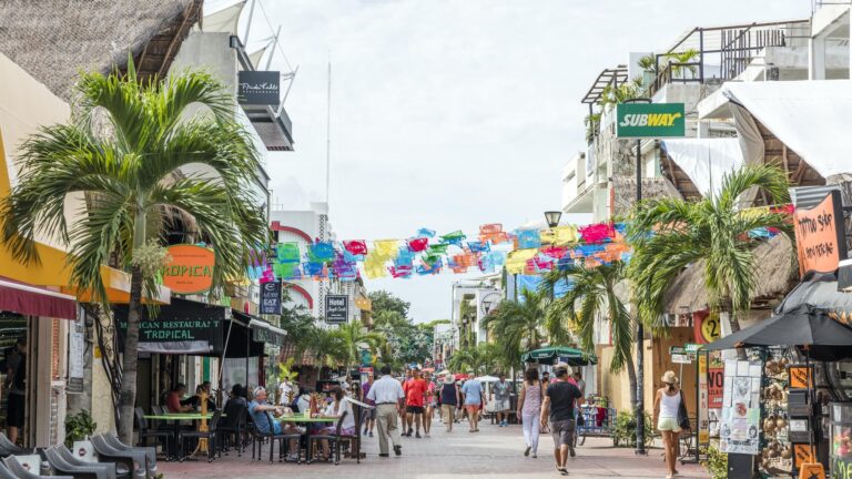 People walking on the street of Akumal