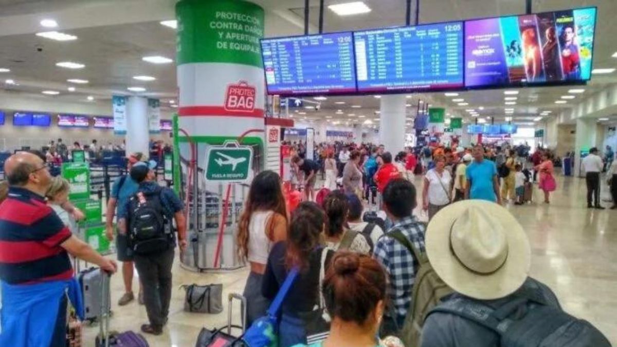 passengers at Cancun International Airport