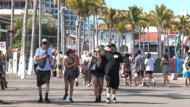 People walkng on Puerto Vallarta Malecon