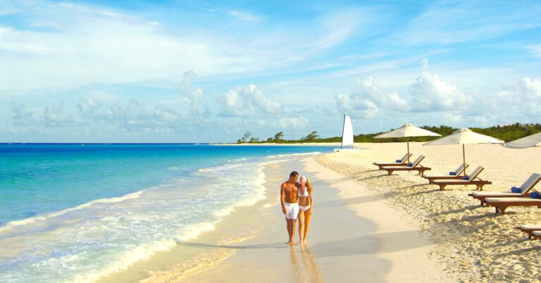 Couple walking on Maroma Beach