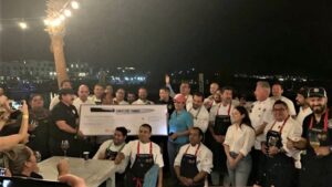 Chefs por Los Cabos with delivered cheque