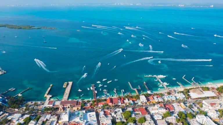 Aerial view of boats leaving Isla Mujeres