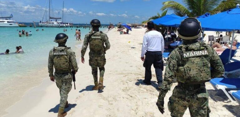 Military patrol on Isla Mujeres beach