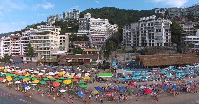 Blue-chairs-hotel-on-los-muertos-beach