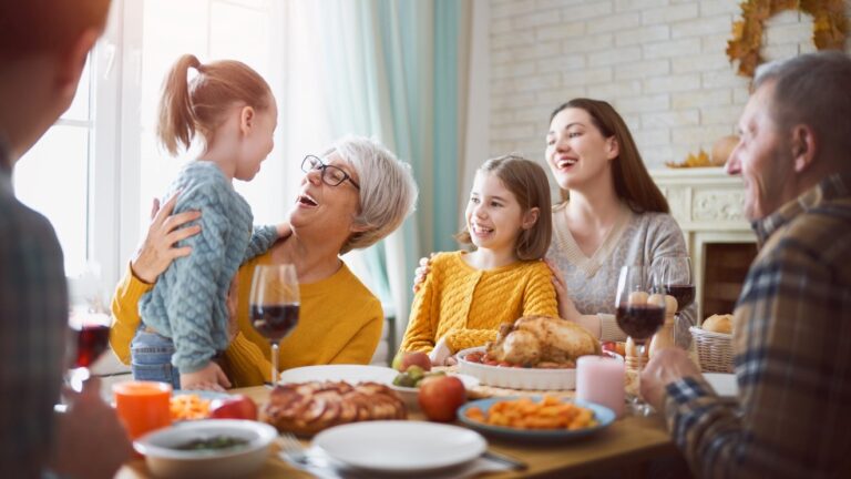 Family at a table celebrating Mother's Day in Mexico