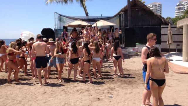 Spring breakers on a Puerto Vallarta beach