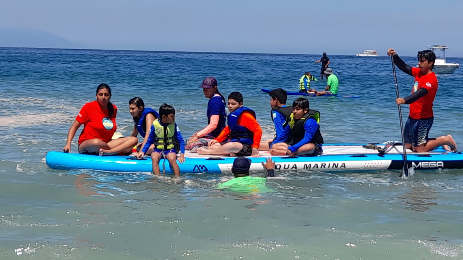 Surfing smiles participants on a board