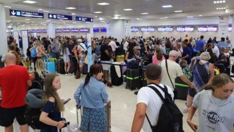 Passengers lined at Cancun International Airport