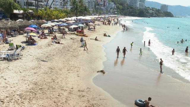 Tourists on a Puerto Vallarta beach