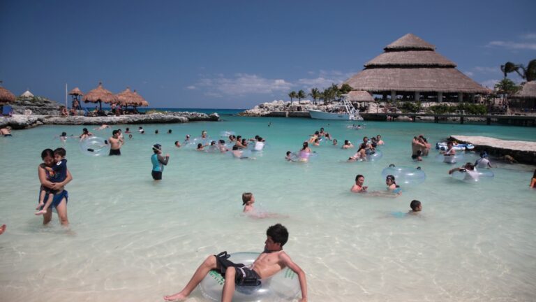 People swimming in a Xel-Ha pool in Cancun