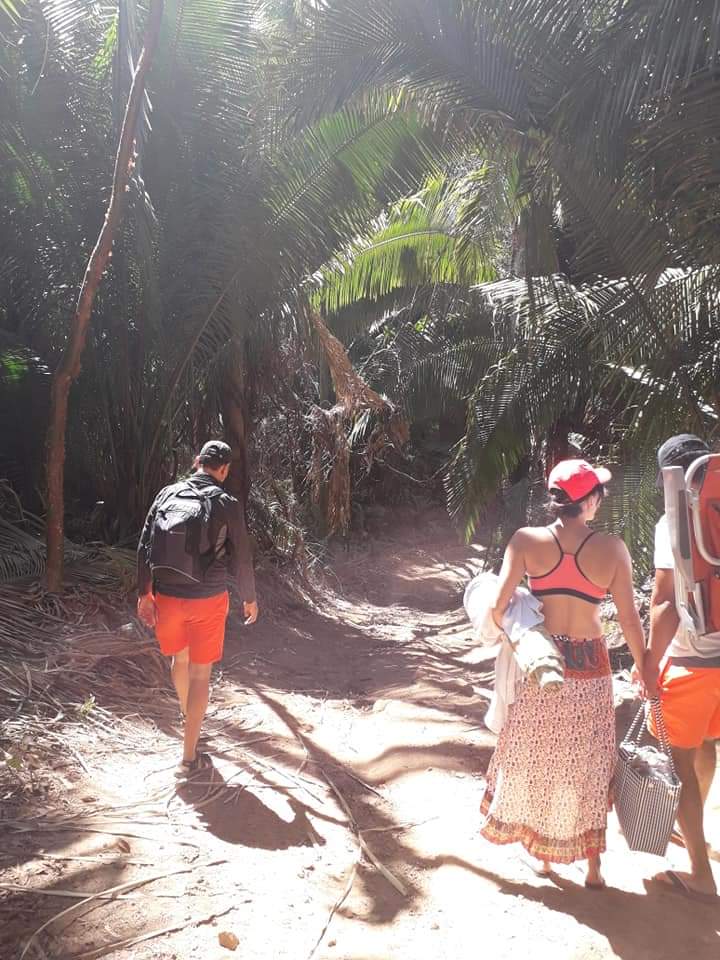 People walking on the hike to Playa del Barro