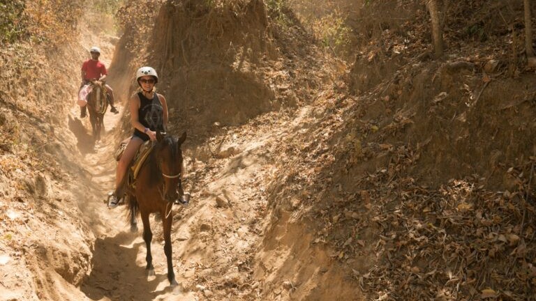 Quimixto trail with a couple riding horses