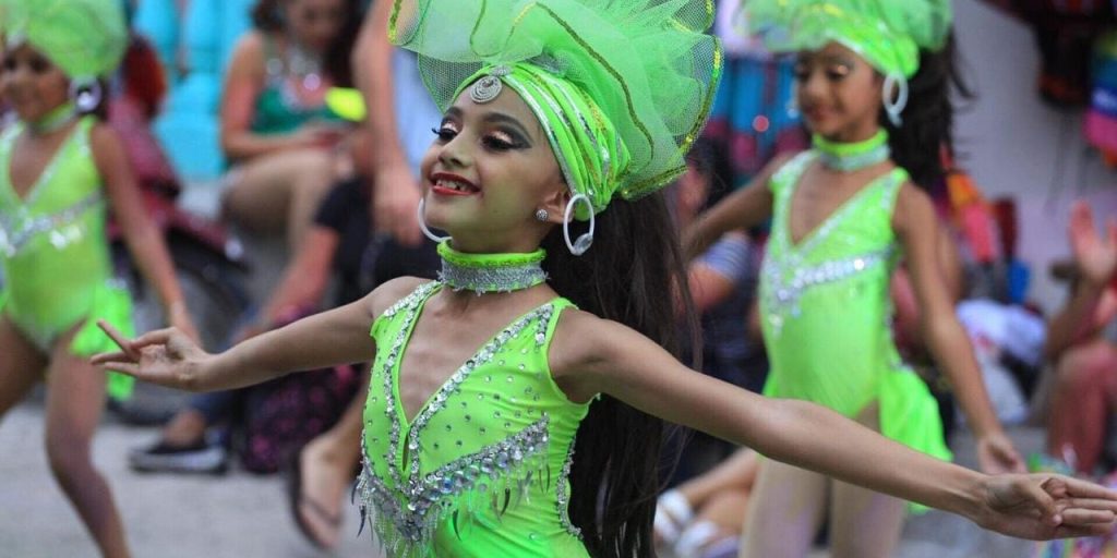 Girl dancing at Isla MUjeres carnival