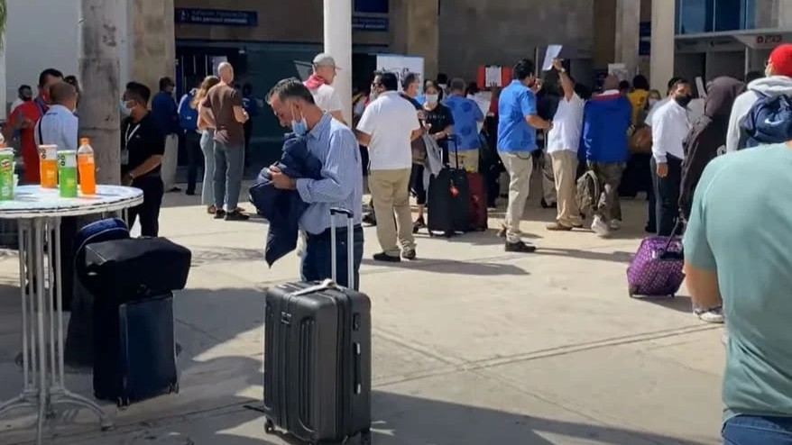 passengers at Cancun airport