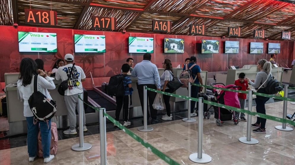 Passengers checking in at Tulum Airport