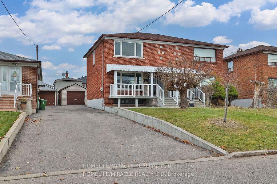 14 Dombey Rd, Toronto, ON M3L1N9 | 3 Bedroom 2 Bathroom Semi-Detached House | Image 2
