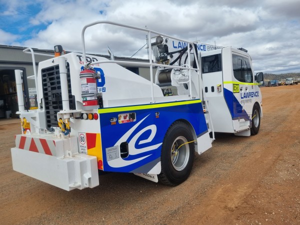 A TIDD PC28-2 Crane, in white and blue, branded to the Lawrence Engineering Colours