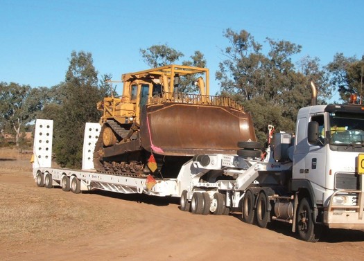 1 Low loader with dolly at work