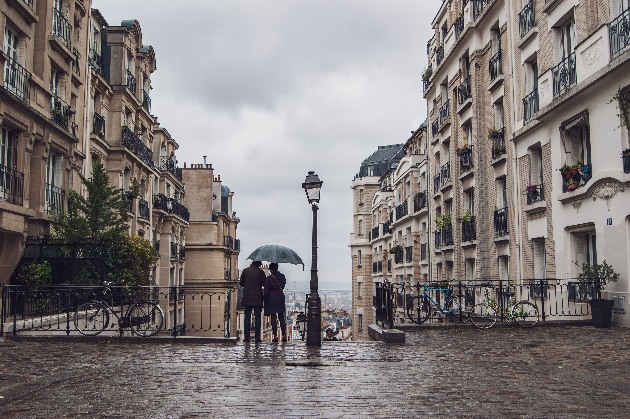 Romantic Couple under umbrella in Montmartre, Paris, France