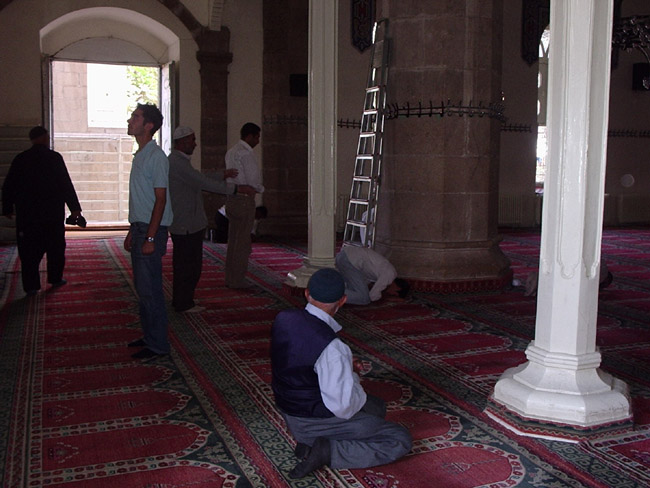 people praying in the mosque