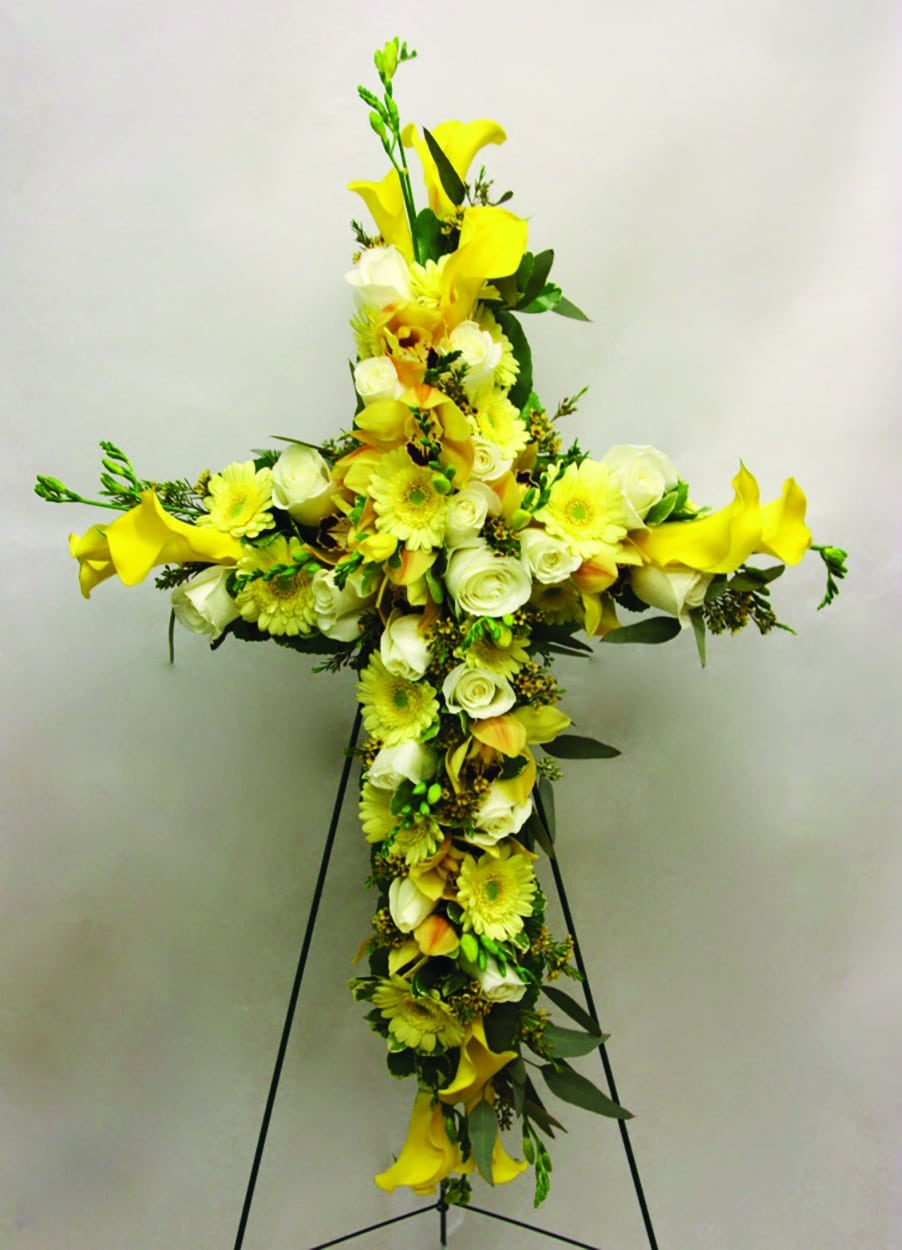 A yellow and white floral cross.
