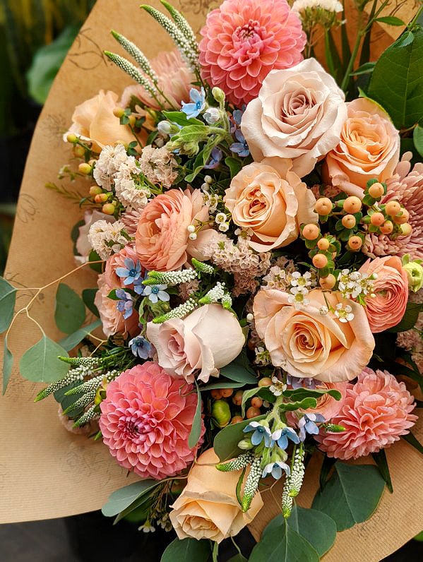 Alternate view of a lush peach hand-tied bouquet.